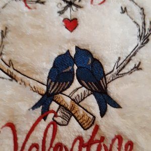 Two Beautiful Love Birds sitting on Tree Limb